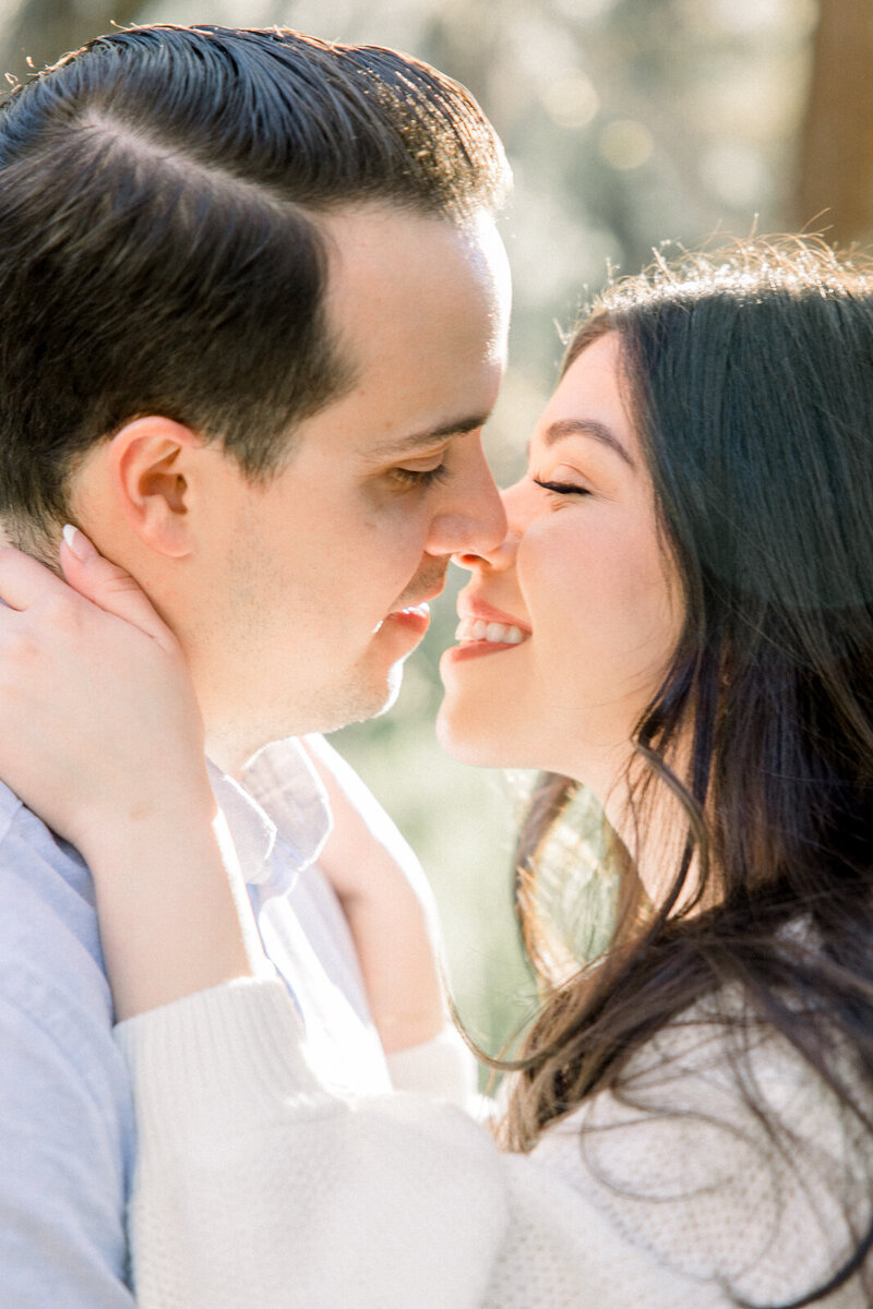 Fresno couple eloping under oak trees with natural surroundings