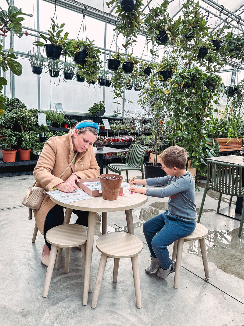 Sarah Kaetterhenry and child coloring at Mill Creek Gardens things to do with kids