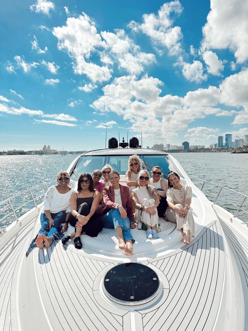 Nicole Crank Inner Circle Mastermind experiencing a group activity on a boat in Palm Beach