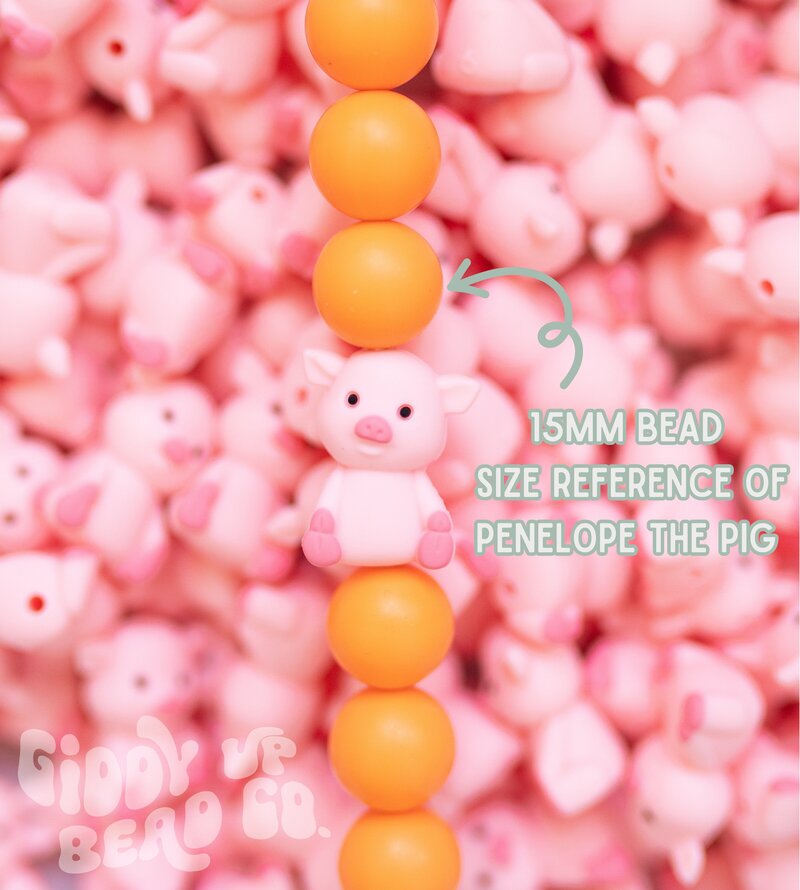 15mm Bead for size reference of Penelope The pig