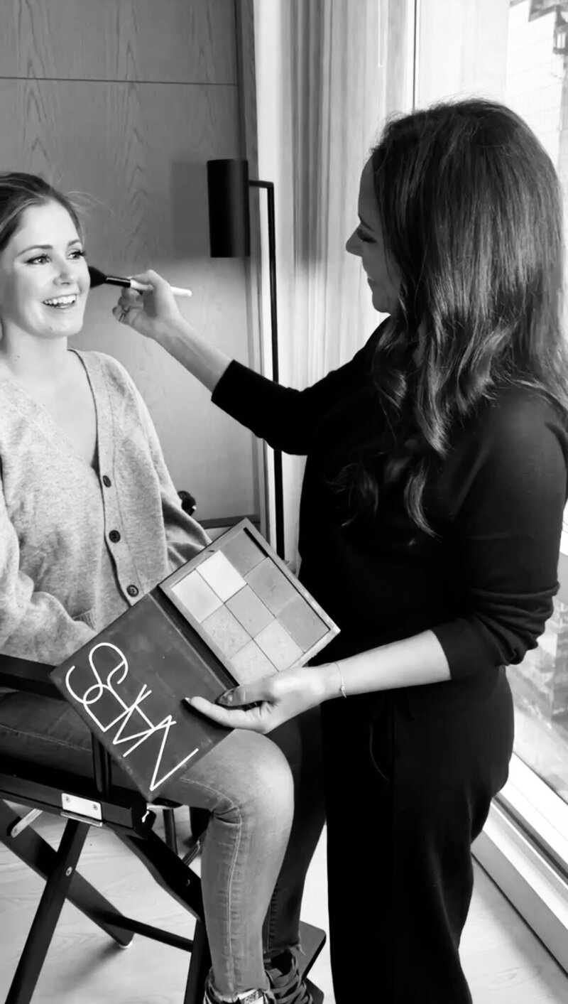 Michelle Stern Makeup Artist applying makeup onto a bride