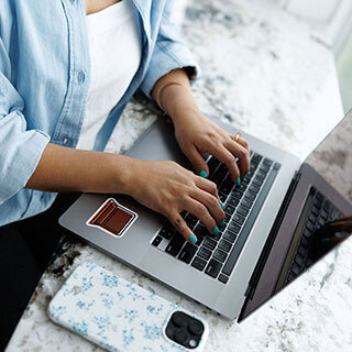 Laptop and notepad ready to start a project