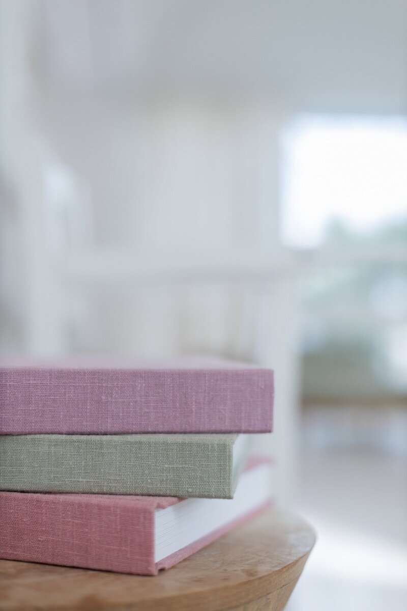 Linen albums on table