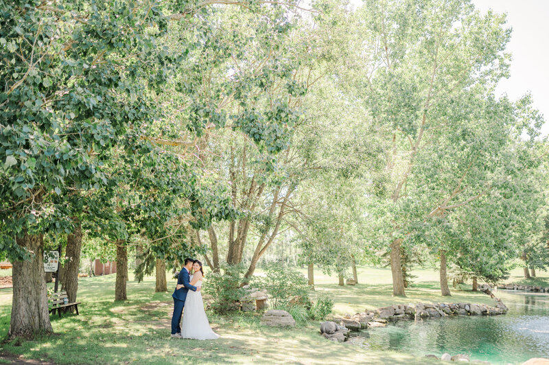Hilltop Wedding Centre - -Bride and Groom by the Pond