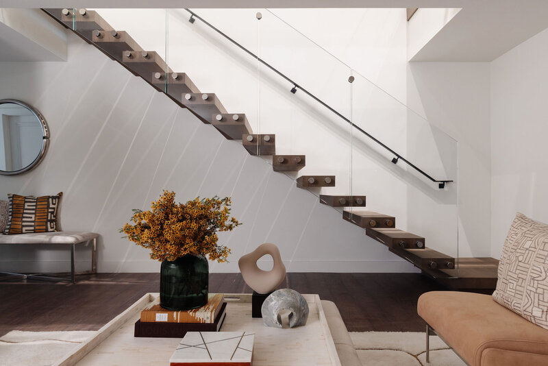 Back Bay duplex townhome with floating glass staircase