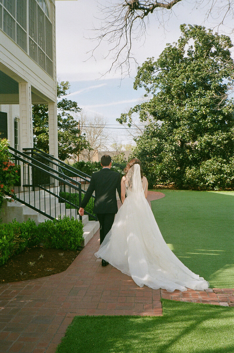 35mm film photo of a documentary style and candid bride in groom in denver colorado