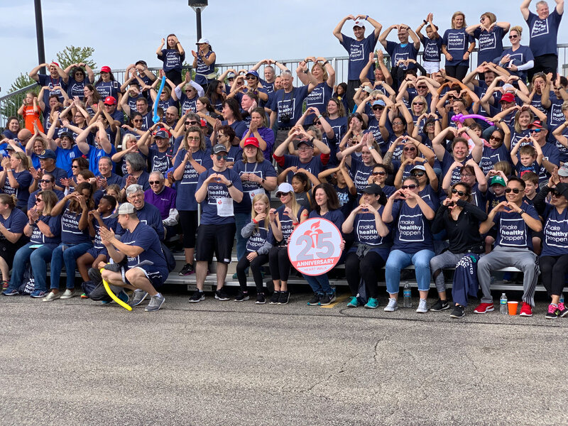 Large corporate group photo with DJ team from Charizma Entertainment in Chicago