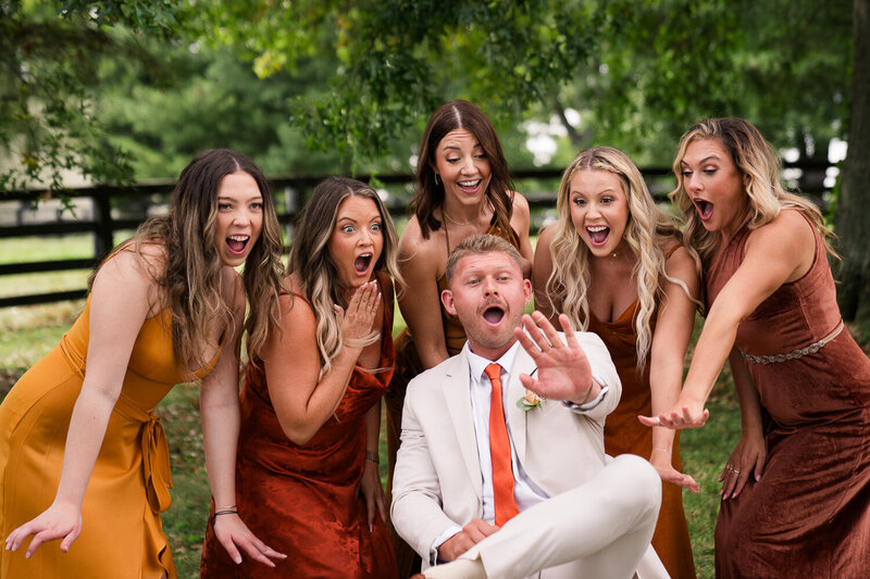 fall-wedding-bridesmaids-portrait-with-groom-1