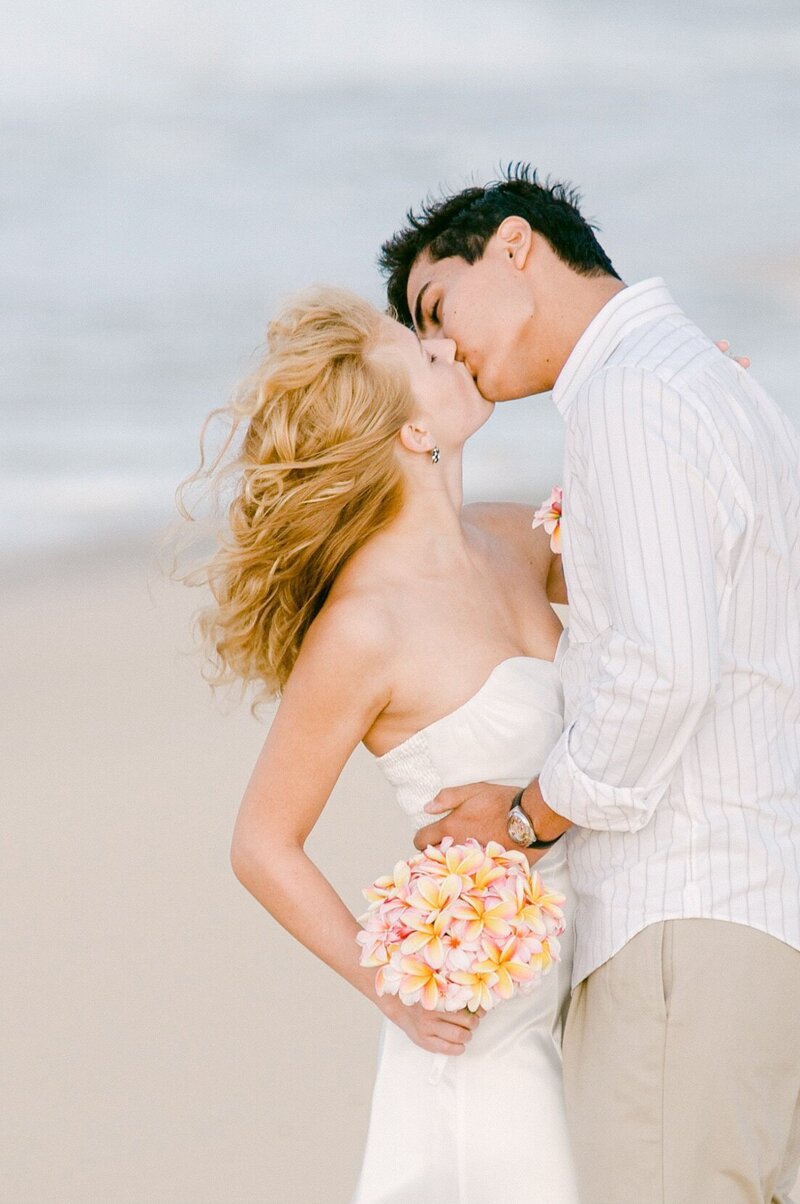 young couple Oahu beach elopement photo of Maui photographer