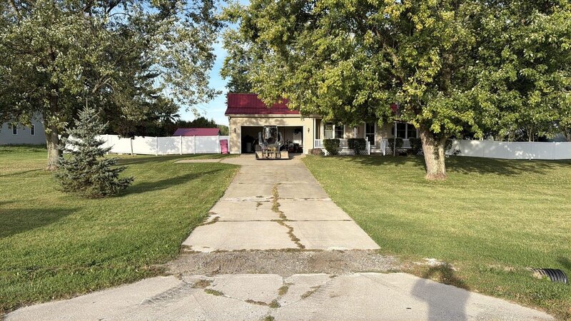 Before: cracked old two-track concrete driveway in Goshen, IN