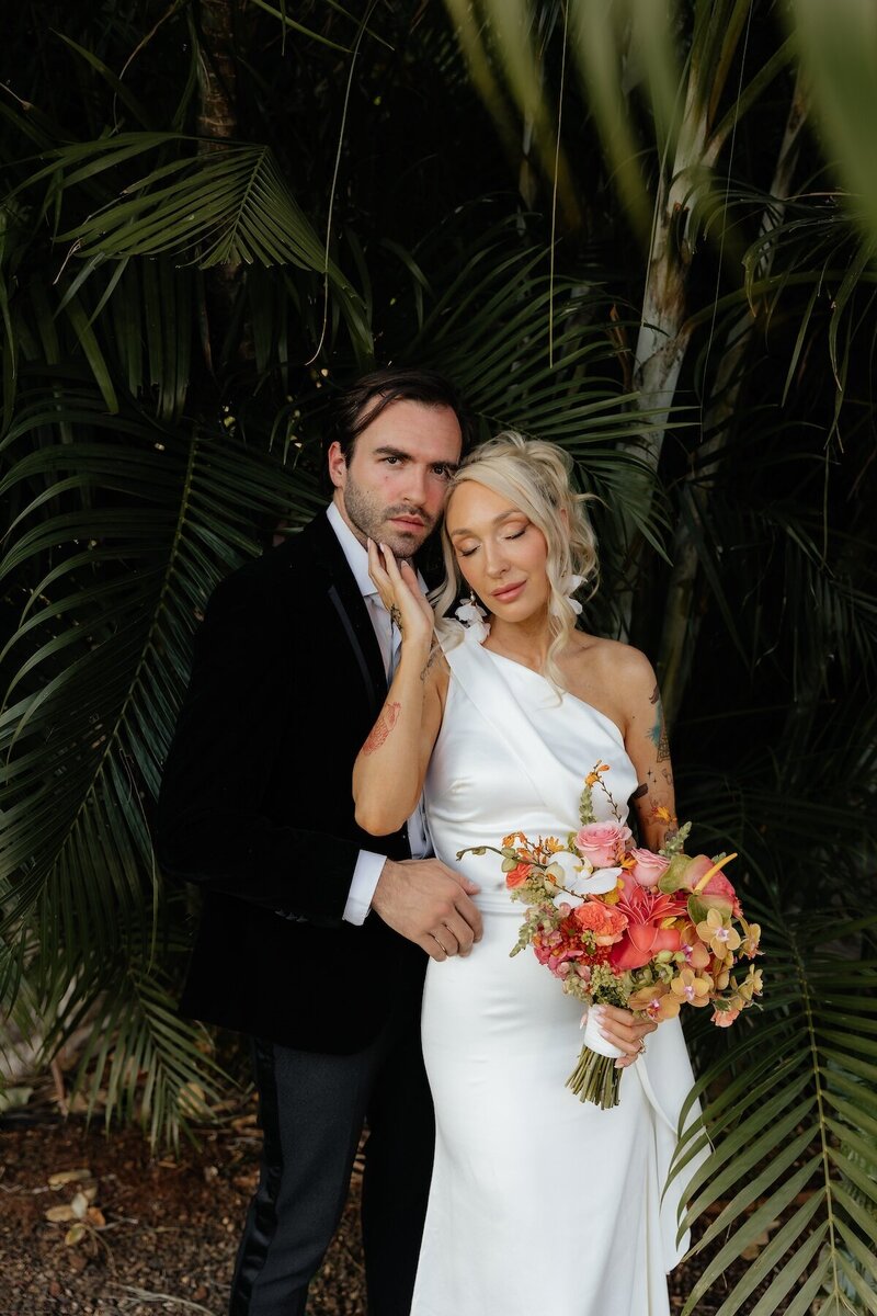bride and groom embrace on elopement day in costa rica