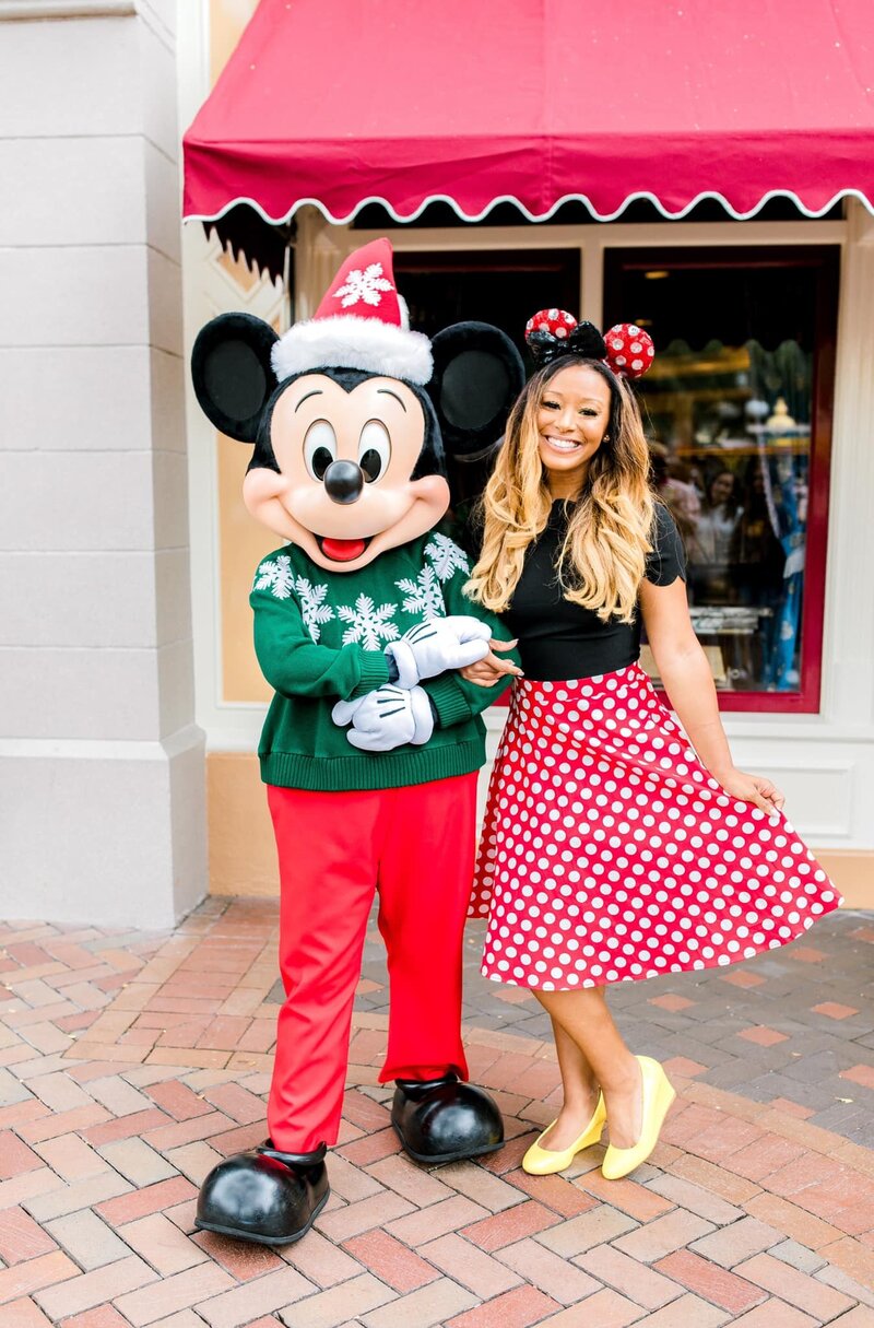 Disney photographer Vanessa with Mickey mouse