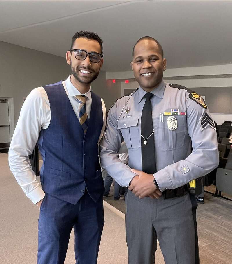 Divorce attorney standing with a police officer in Central Ohio