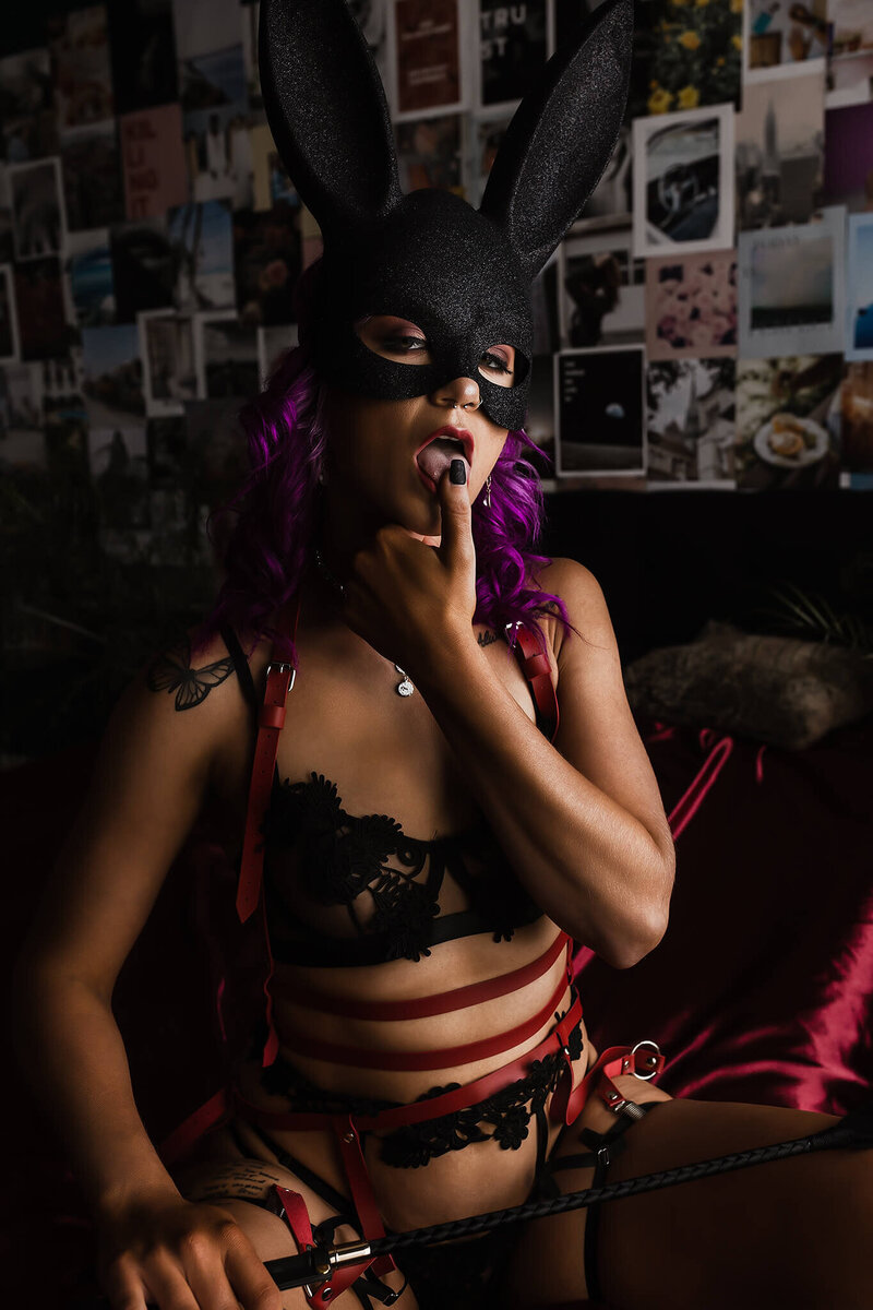 NSFW boudoir photo licking finger