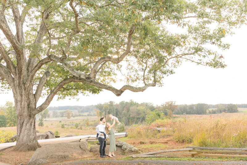 family photo session with huge tree at the top of Devil's Den