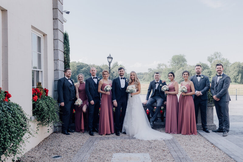 large-bridal-party-bridesmaids-in-pink-ast-castlemartyr