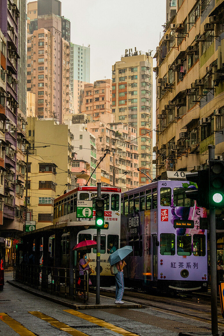 Busy city street filled with buildings and people, highlighting a vibrant atmosphere for nutrition counseling services.