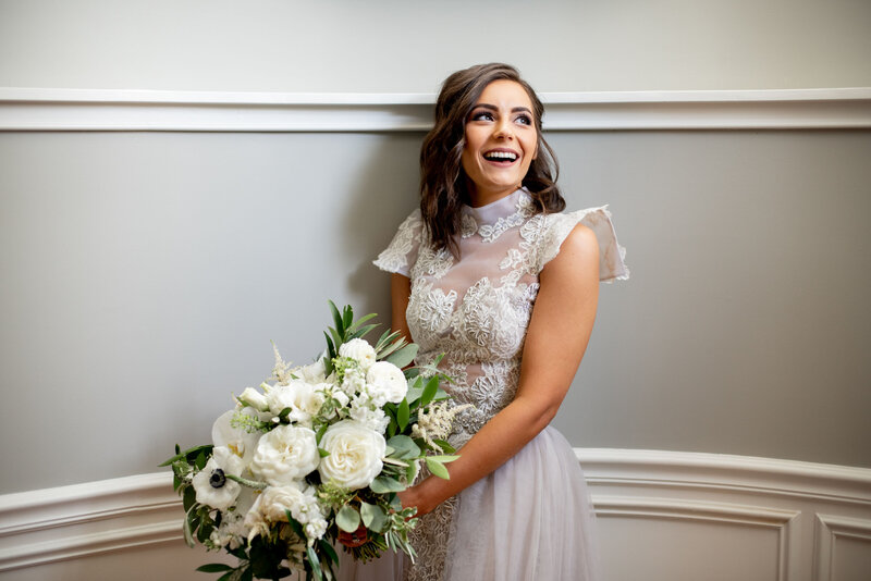 Bride with large white bouquet