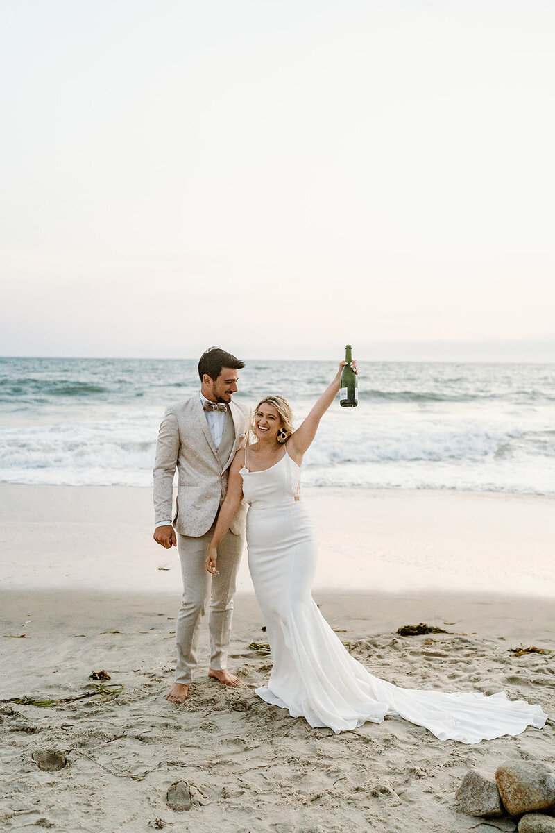 newlyweds champagne pop on bech