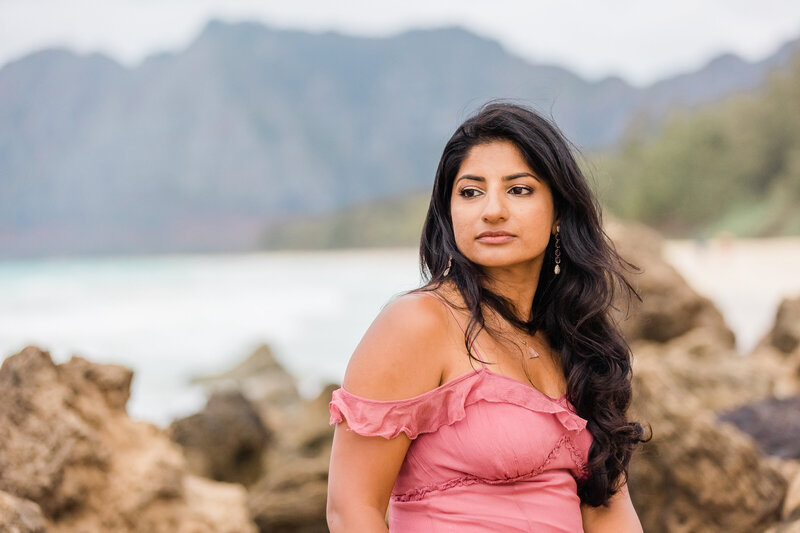 Life coach Radhika standing outside with mountains in background