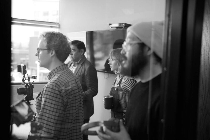 Indie film producer Cassi Angier is on set with colleagues at a commercial shoot.