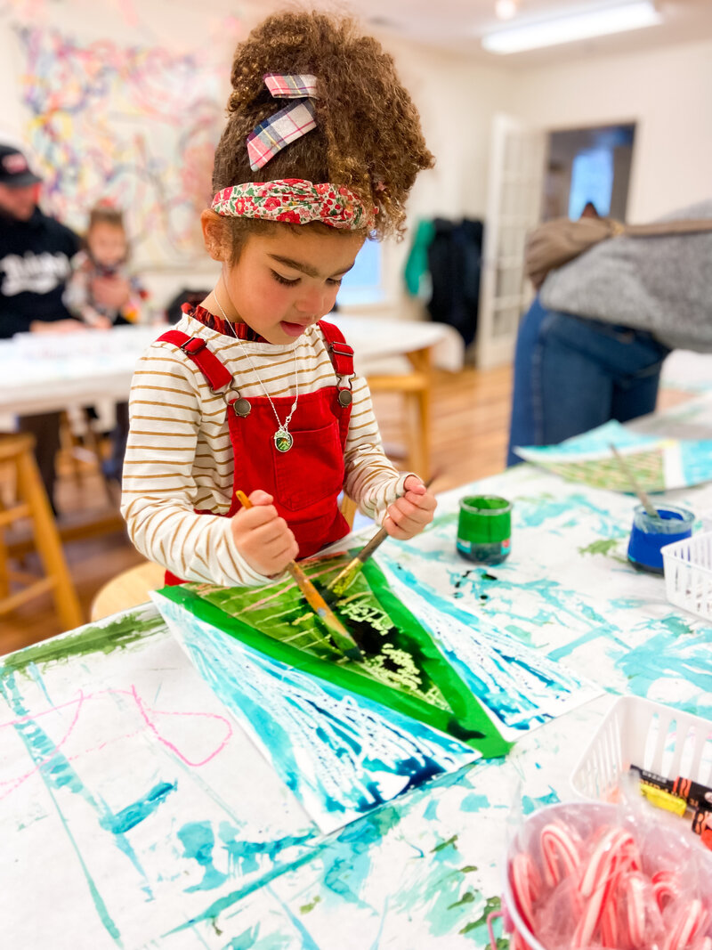 Artcie girl painting with watercolors