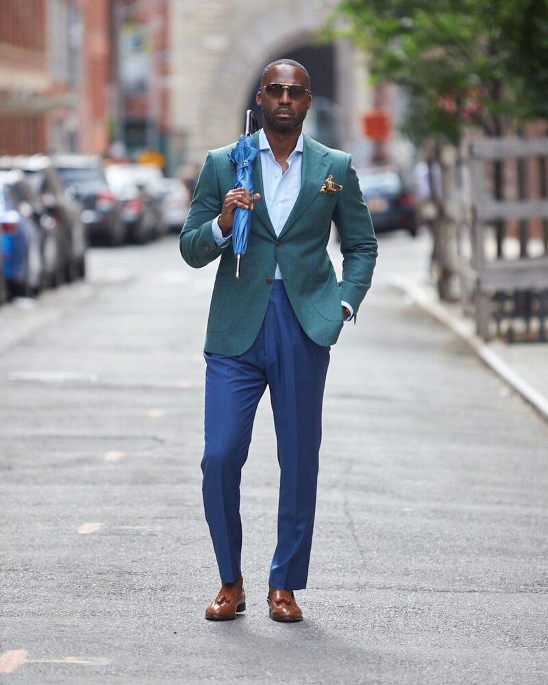 Capsule wardrobe with a green coat and blue pants