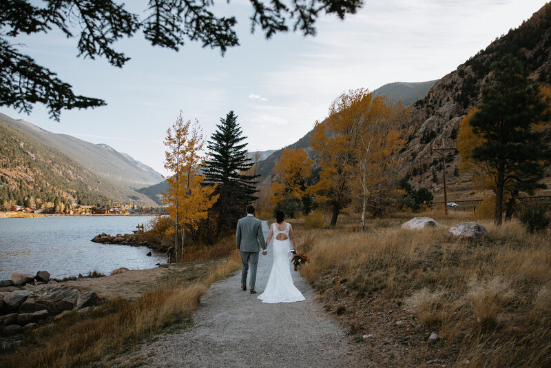 Groom spinning bride in wedding dress taken by fargo wedding photographer kiella lawrence