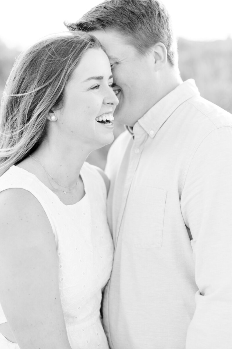 Couple smiling close together
