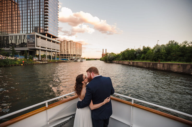 Bride and groom kiss on Chicago's First Lady Cruise.