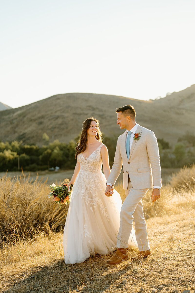 bride running down road
