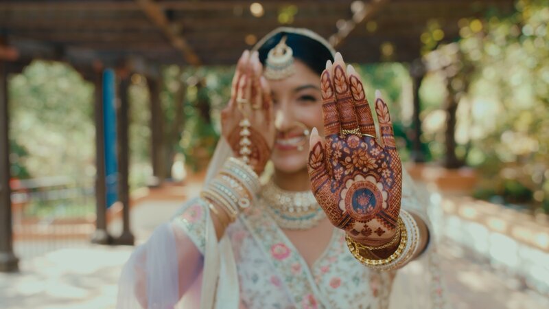 Indian bride showing Mehndi