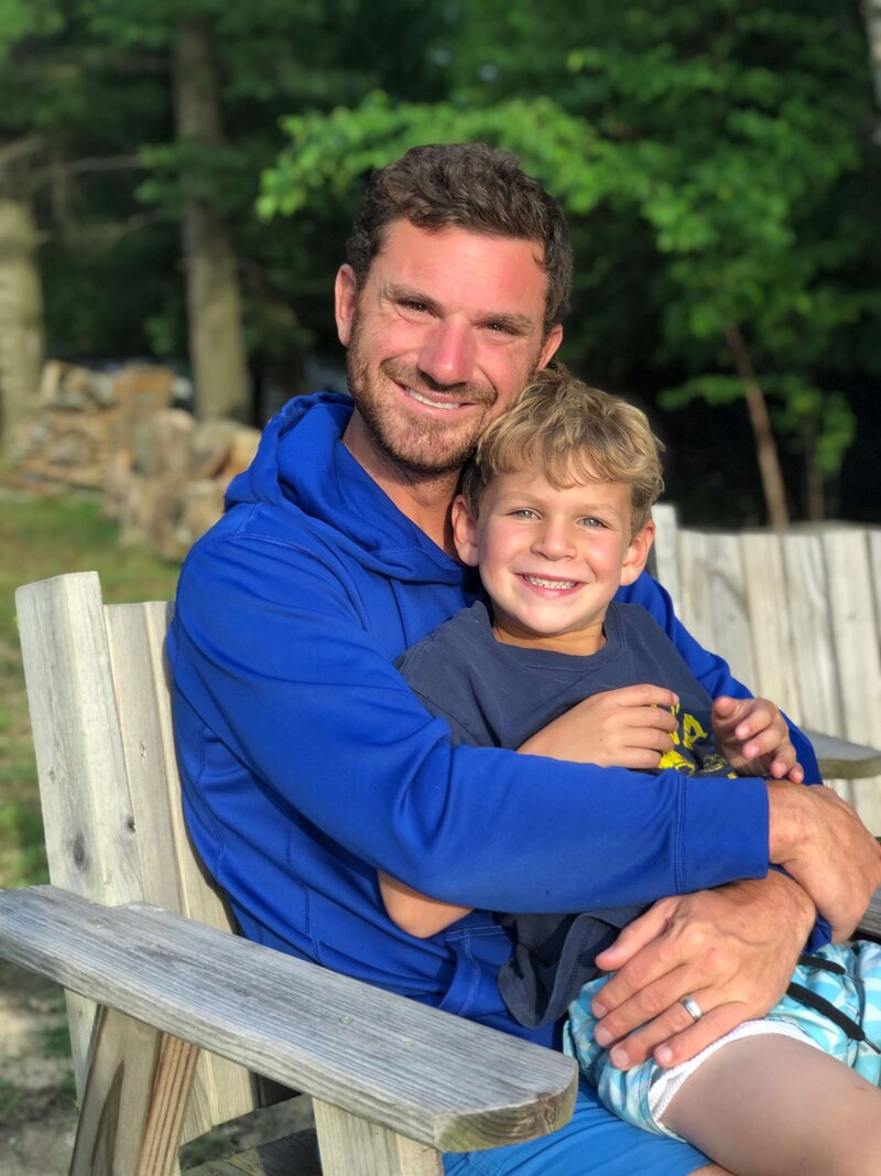 Jon and son smiling for camera