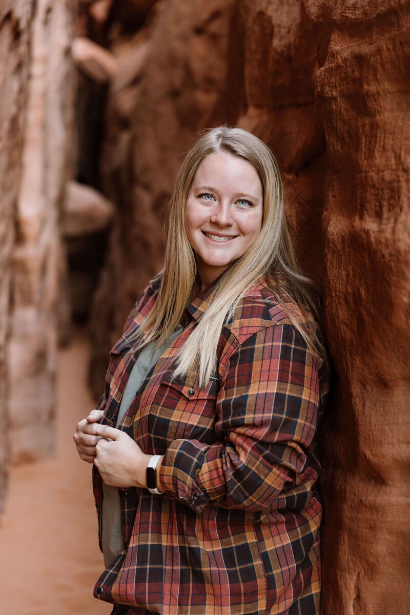 headshot portrait in moab, utah with red rocks wearing flannel