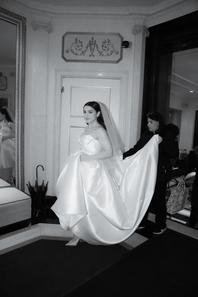 Portrait of bride and groom dancing at their wedding reception.