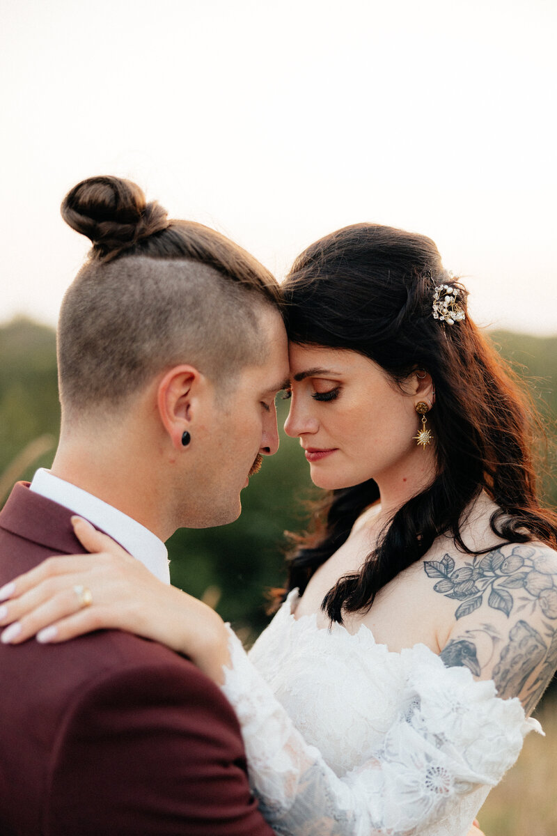 A couple forehead to forehead.