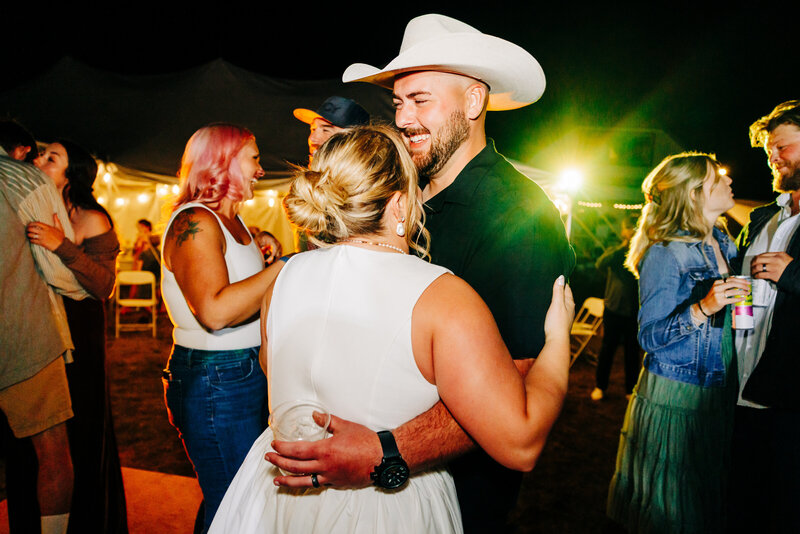 Western Montana bride and groom dancing at wedding reception in Choteau, MT