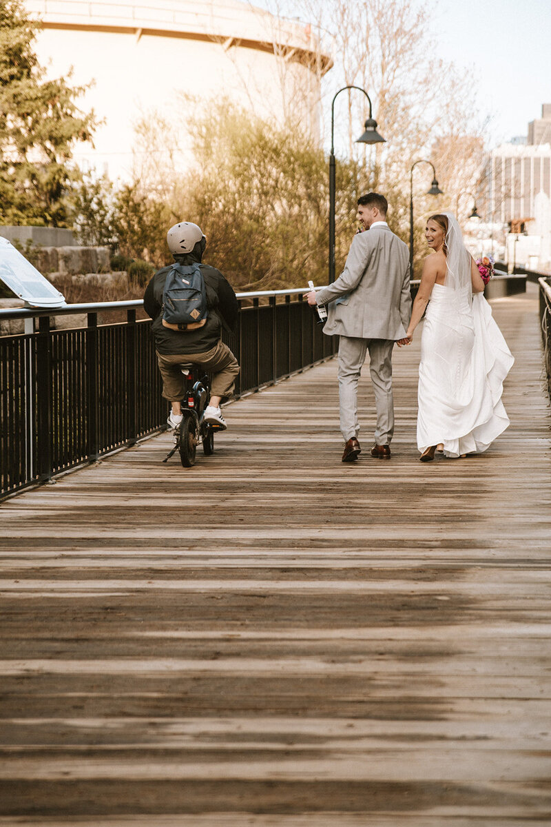 Couple looking at biker