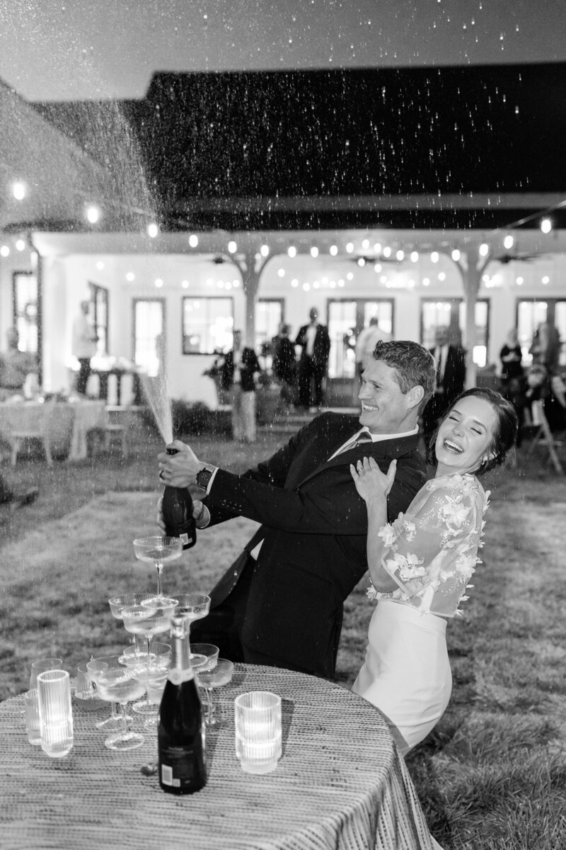 Bride and groom cheering after ceremony at the Huguenot Loft