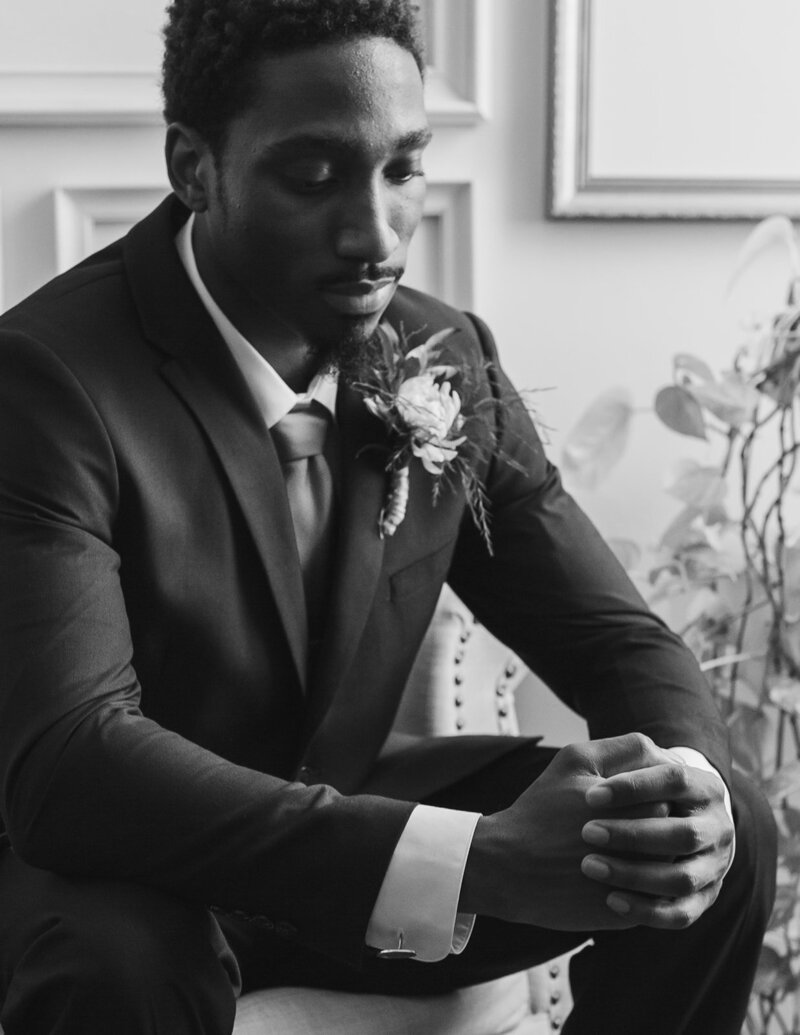 groom praying before wedding