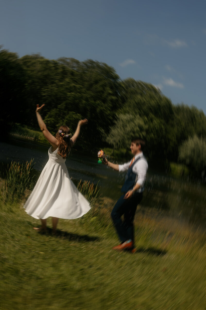 man and woman embracing and laughing