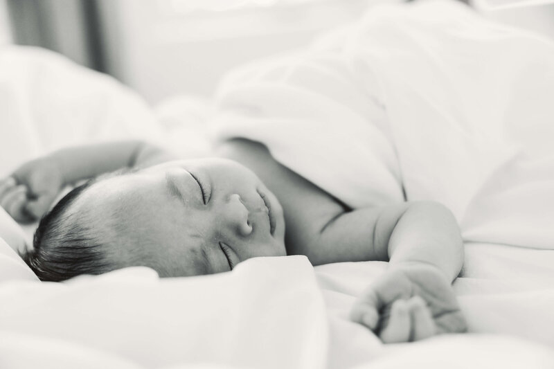 Sleeping Baby Wrapped in Soft Blanket