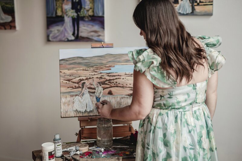 Debbie Bowman painting a commission piece in her studio in South Dakota
