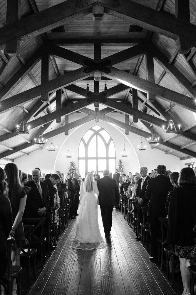 Photograph of bride and groom dancing at their wedding reception.