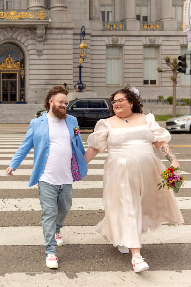 queer plus size couple leaving their SF city hall elopement