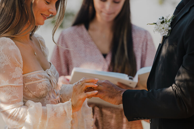 Gulf Shores wedding ceremony couple shares rings