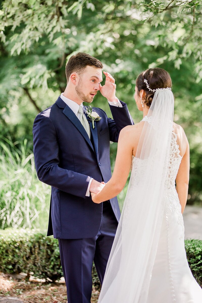 groom wiping tears by Knoxville Wedding Photographer, Amanda May Photos
