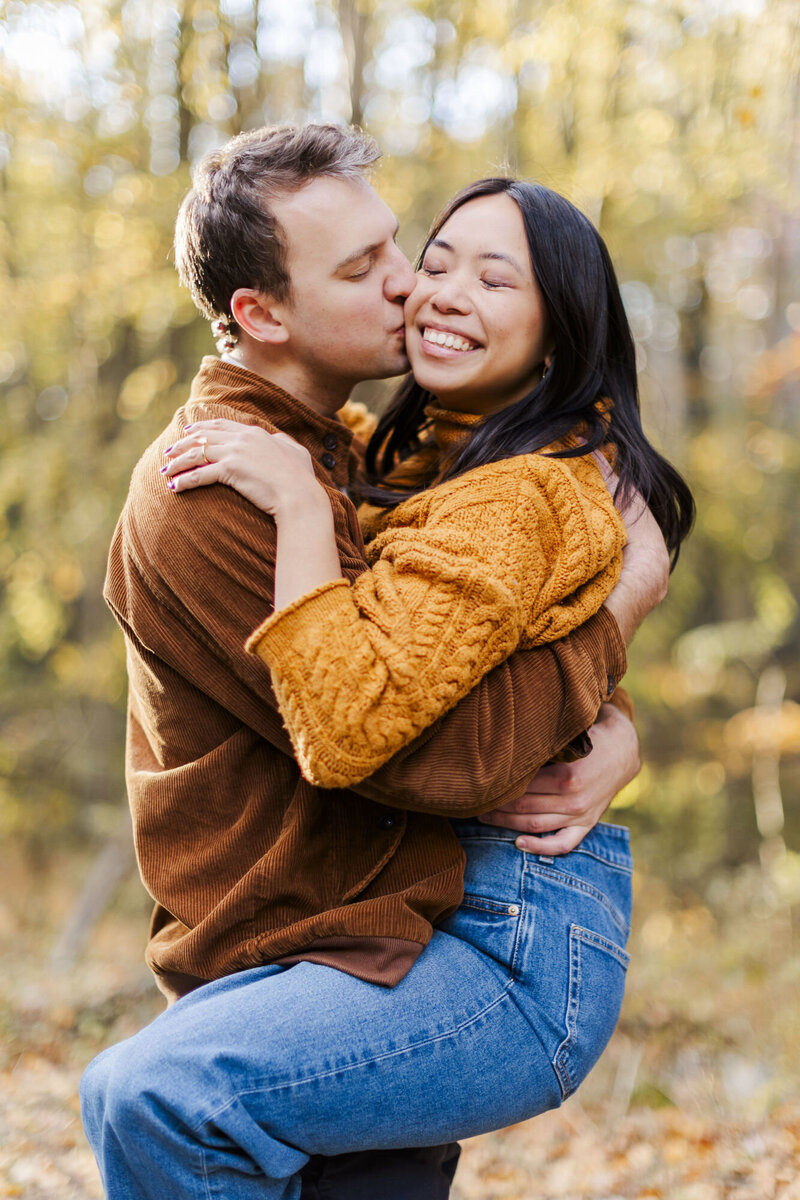 Hudson Valley wedding photographers capturing affectionate moments during engagement pictures
