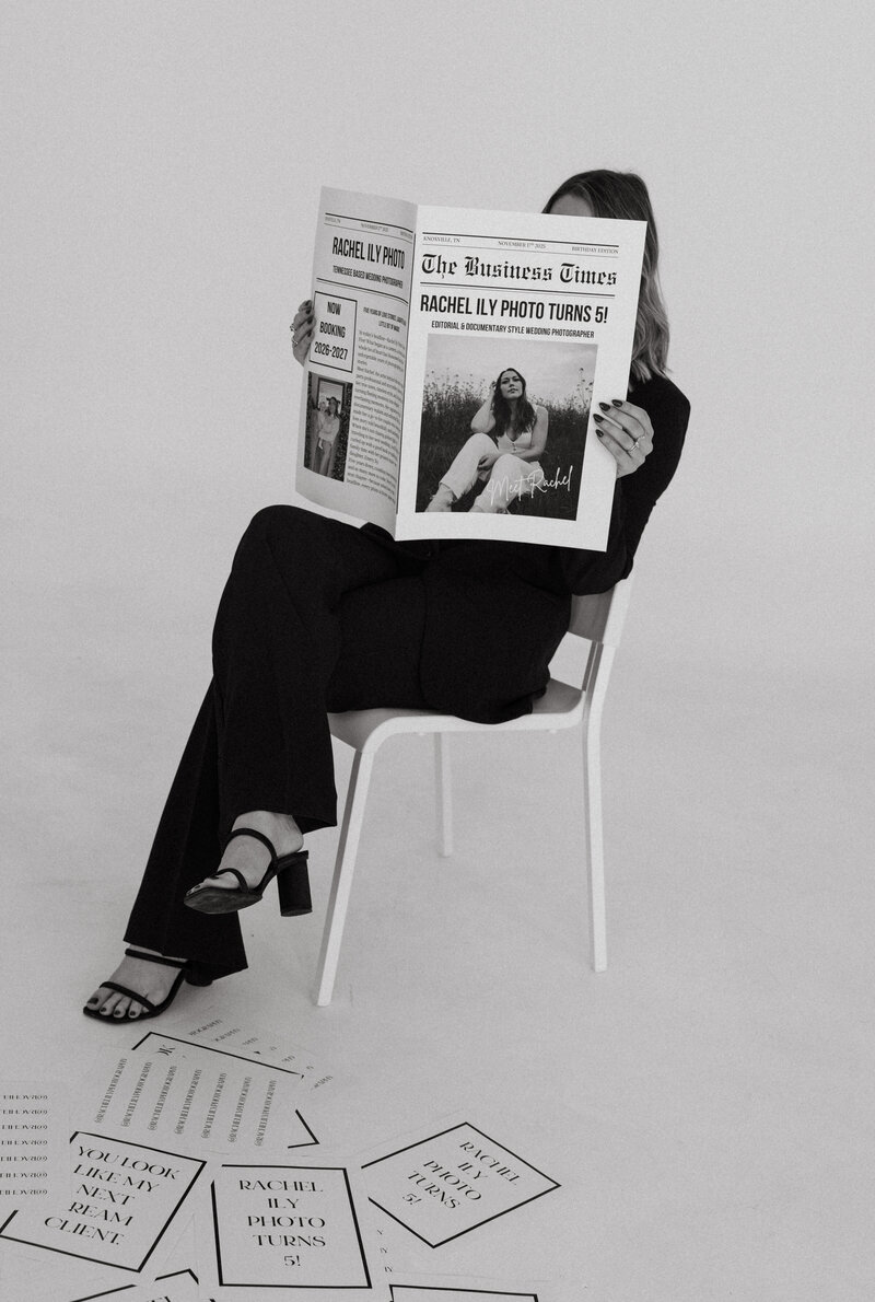 behind the scenes of Wedding Photographers in Knoxville reading a newspaper 