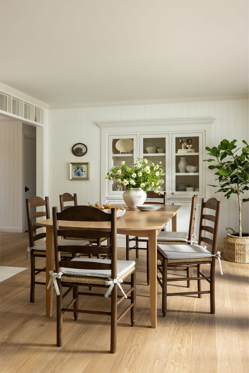 Kitchen with cream cabinetry and natural light